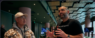 Two people in conversation at a Collective Shift workshop